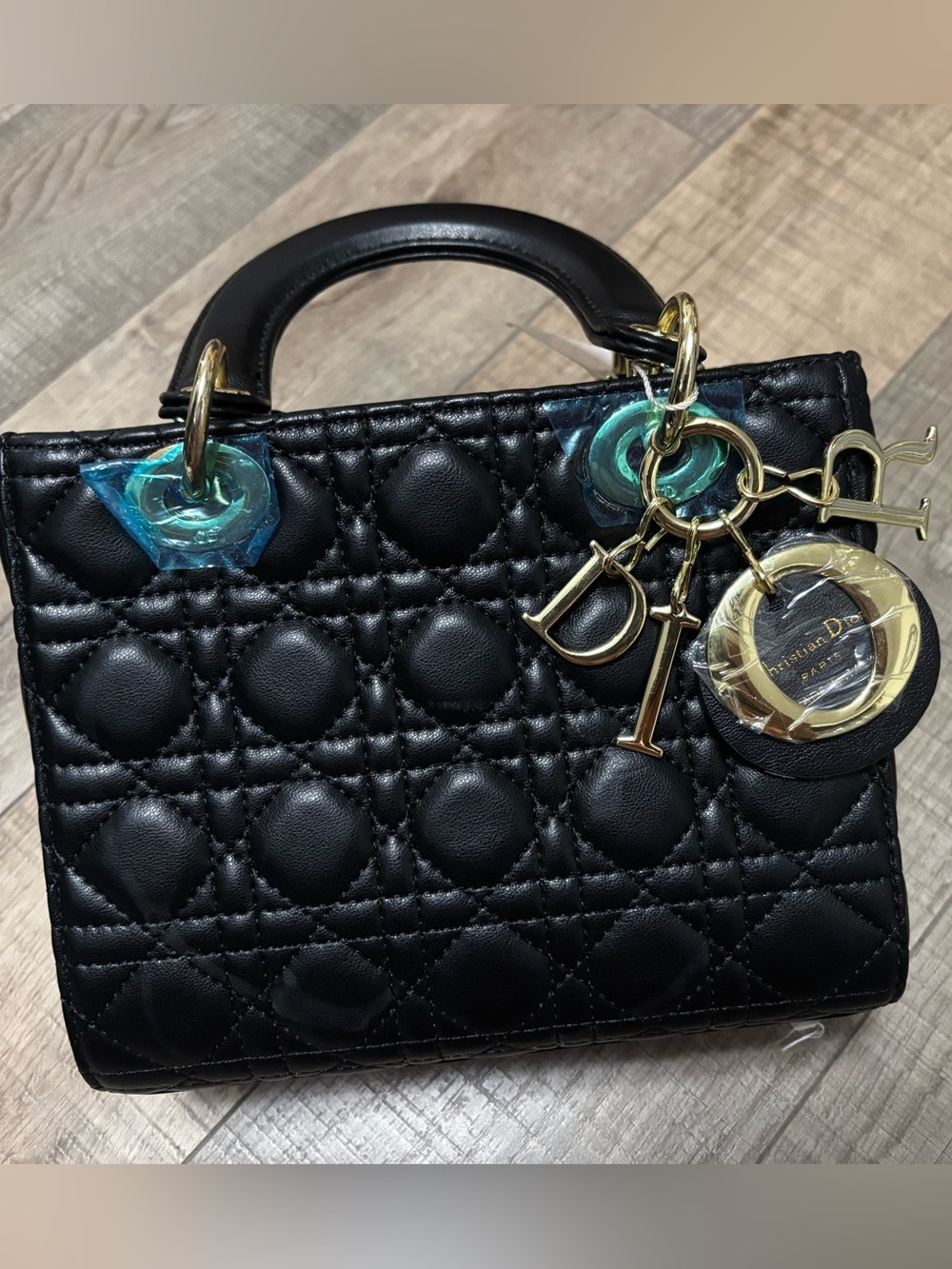 Black Quilted Mini Top-Handle Bag with Gold Accents
